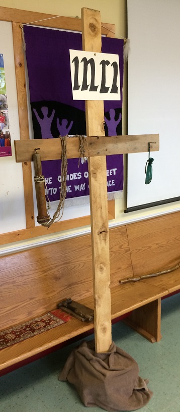 The Symbols of Lent - nails are hammered into the cross and the bag of coins and whip are hung from the nails. Fourth Sunday in Lent, March 31, 2019.